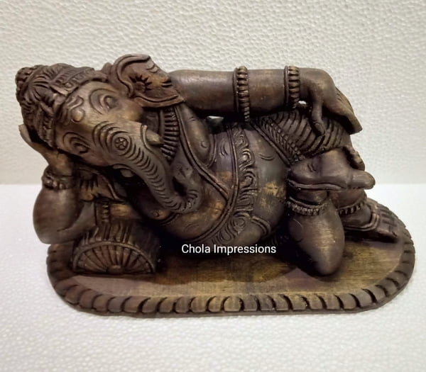 Reclining Vaastu Ganesh (Vaastu Vinayagar) Wooden statue - Antique style Reclining Vaastu Ganesh (Vaastu Vinayagar) Wooden statue - Antique style